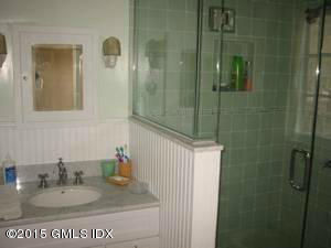 25 Terrace Avenue Riverside, CT 06878 - Photo 7 of 10 a bathroom with a sink and a mirror