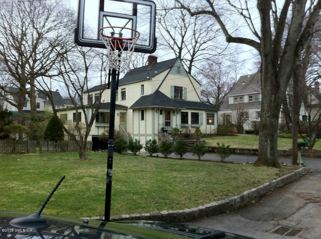 25 Terrace Avenue Riverside, CT 06878 - Photo 10 of 10 a front view of a house with garden