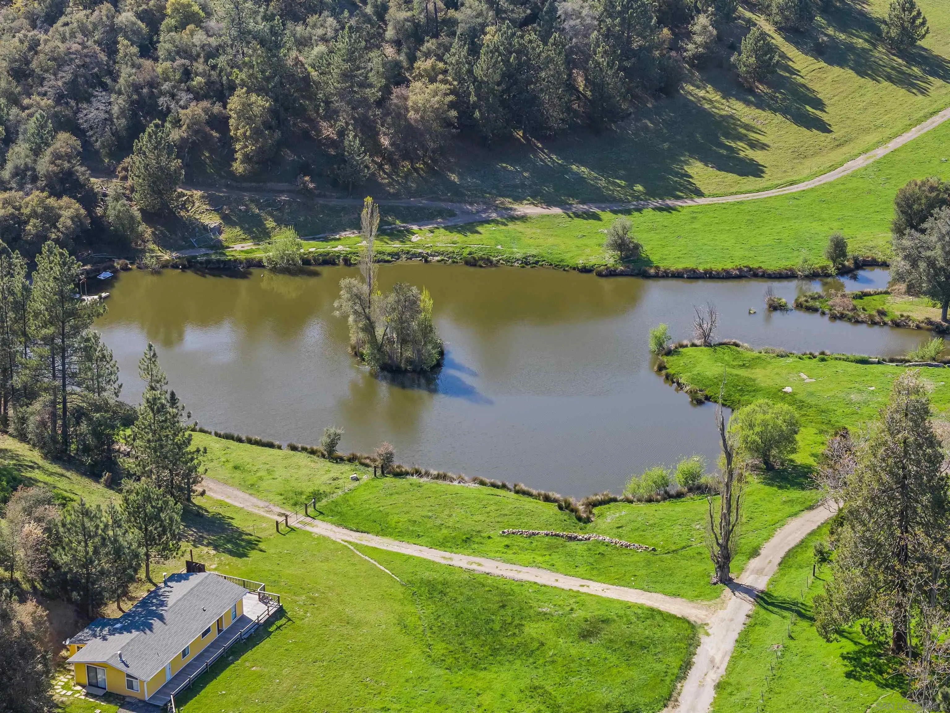2464 Wynola Road Julian, CA 92036 - Photo 45 of 50 an aerial view of a house with a yard basket ball court and outdoor seating