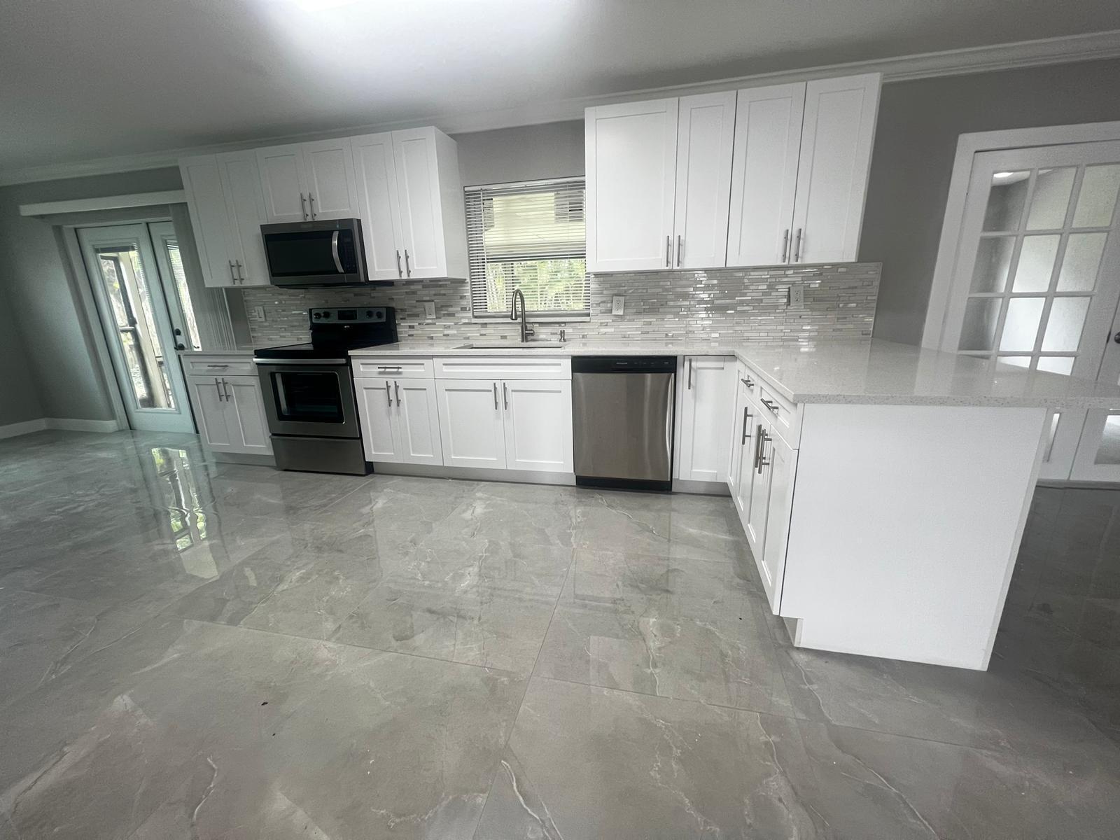 4585 Betelnut Street Boca Raton, FL 33428 - Photo 1 of 27 New Kitchen w/Cuartz Counters
