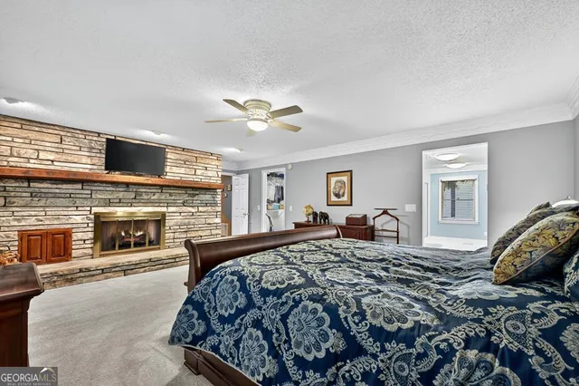 a view of a lake with houses in the back