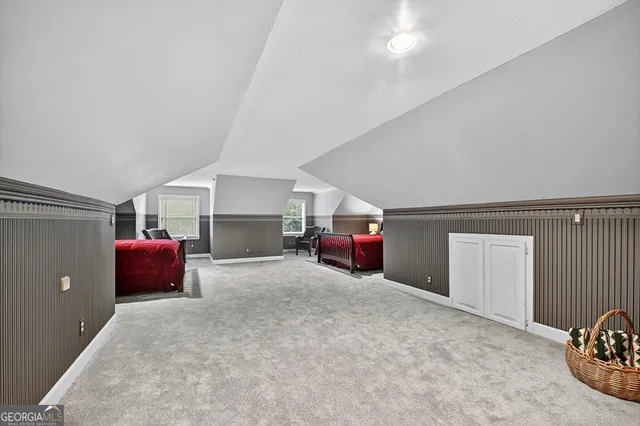 a bathroom with a sink a mirror and a toilet