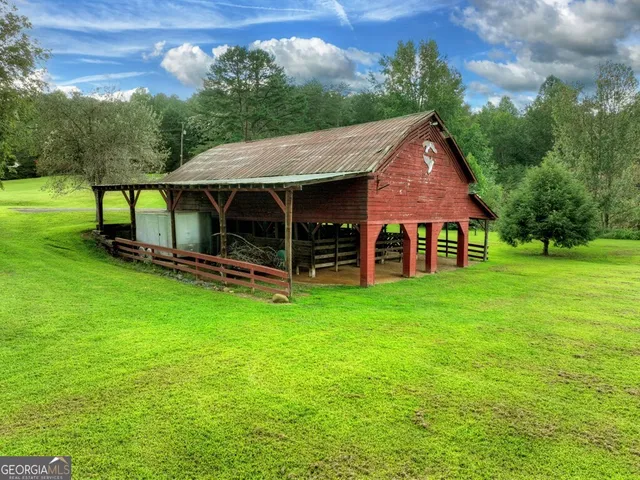a bedroom with furniture and windows
