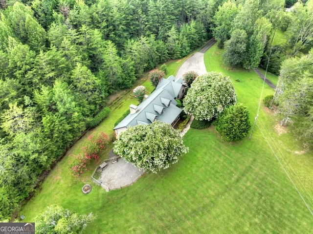 a bathroom with a sink a vanity and a mirror