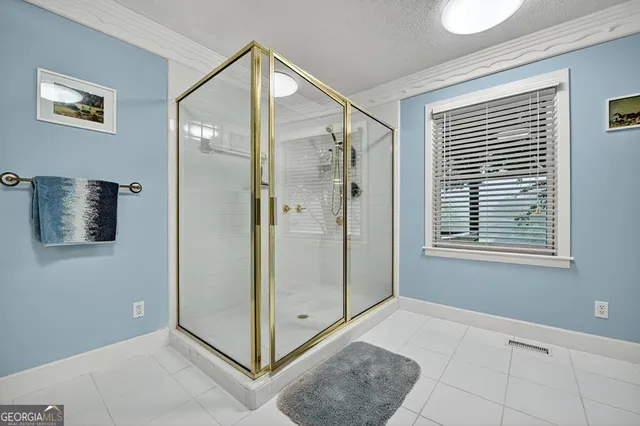 a bathroom with a sink a vanity and a mirror