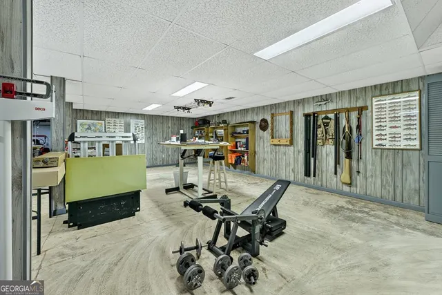 a view of a big room with furniture and window