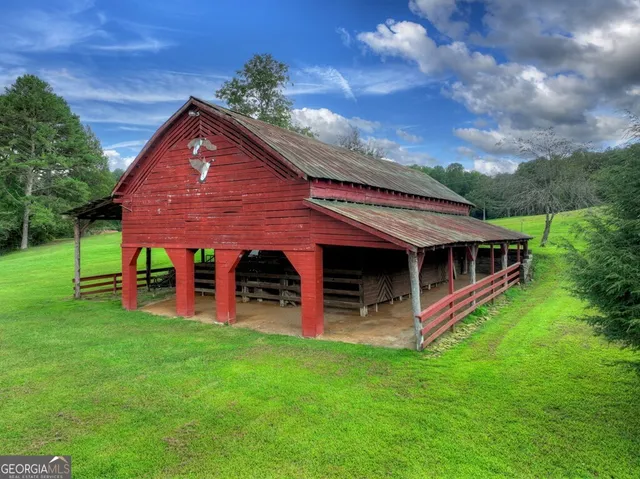 a view of a garden with a building in front of it