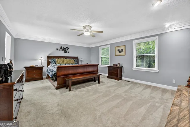 a view of a lake with a yard