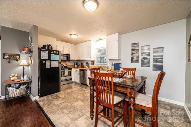 a view of a dining room with furniture