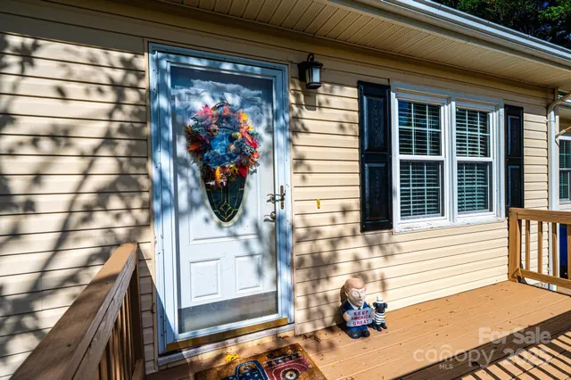 a view of a porch with a dining space