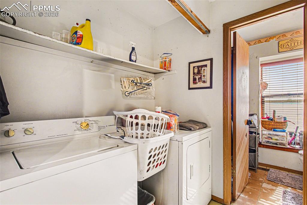 921 Candlestar Loop North Fountain, CO 80817 - Photo 17 of 23 a utility room with dryer and washer