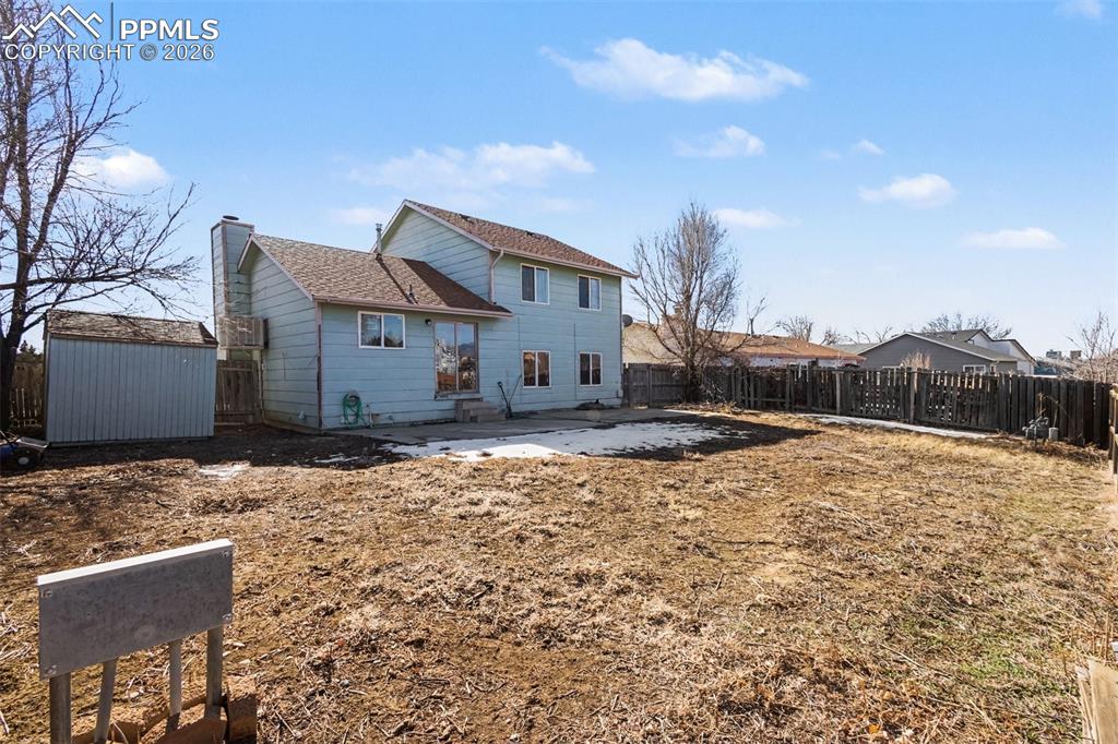 921 Candlestar Loop North Fountain, CO 80817 - Photo 20 of 23 a house view with a yard