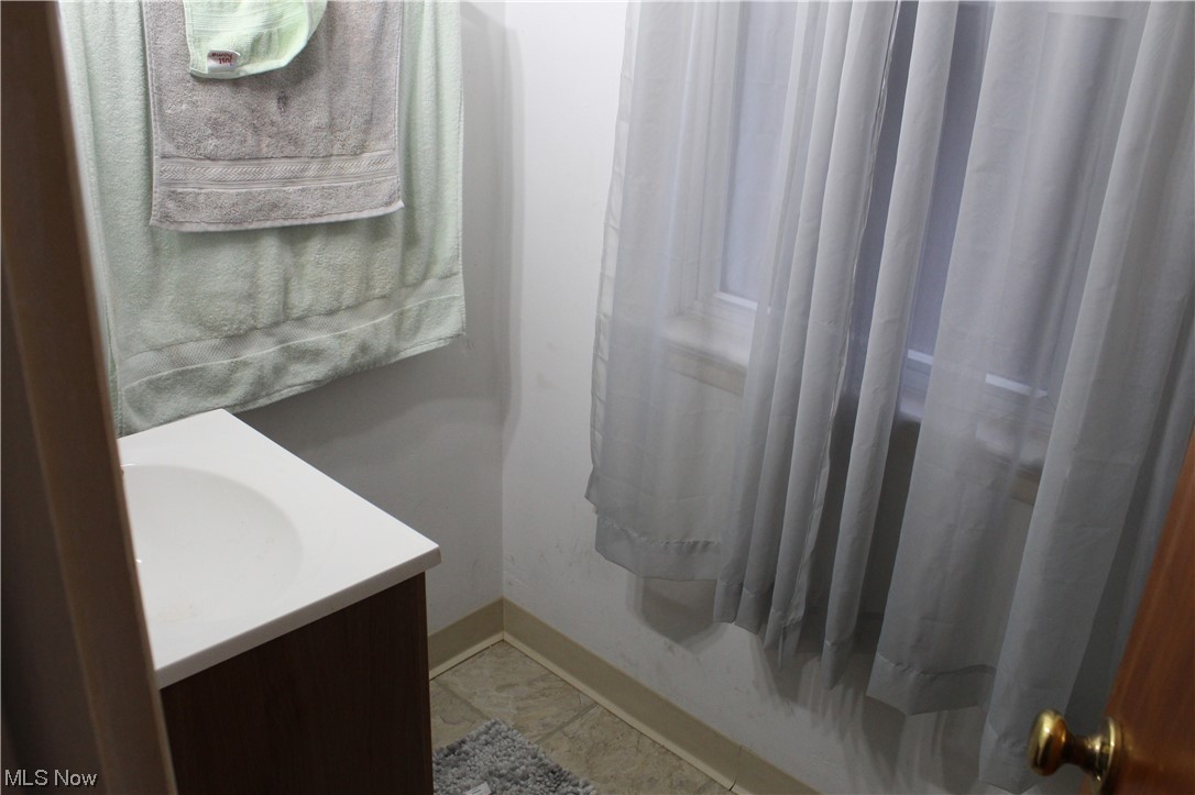 1292 Ford Road Lyndhurst, OH 44124 - Photo 20 of 25 Bathroom featuring tile floors and vanity