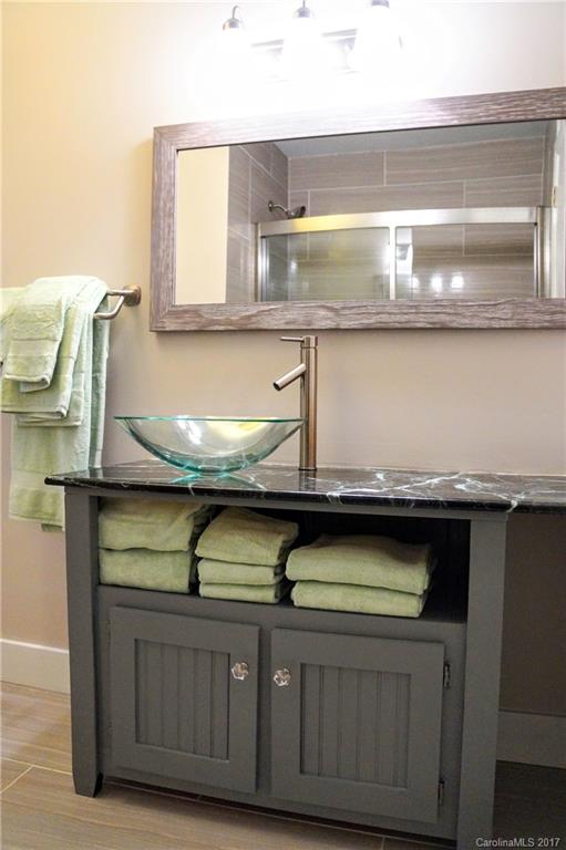 330 Whitestone Road Charlotte, NC 28270 - Photo 13 of 23 a kitchen with a sink and cabinets