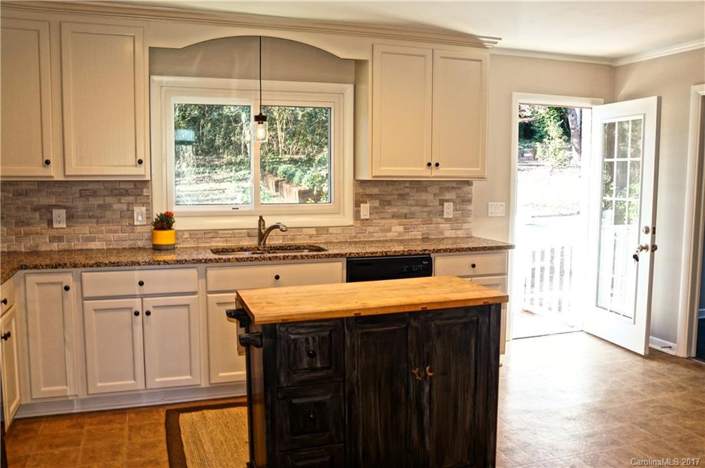 330 Whitestone Road Charlotte, NC 28270 - Photo 5 of 23 a kitchen with stainless steel appliances granite countertop a sink and a white cabinets