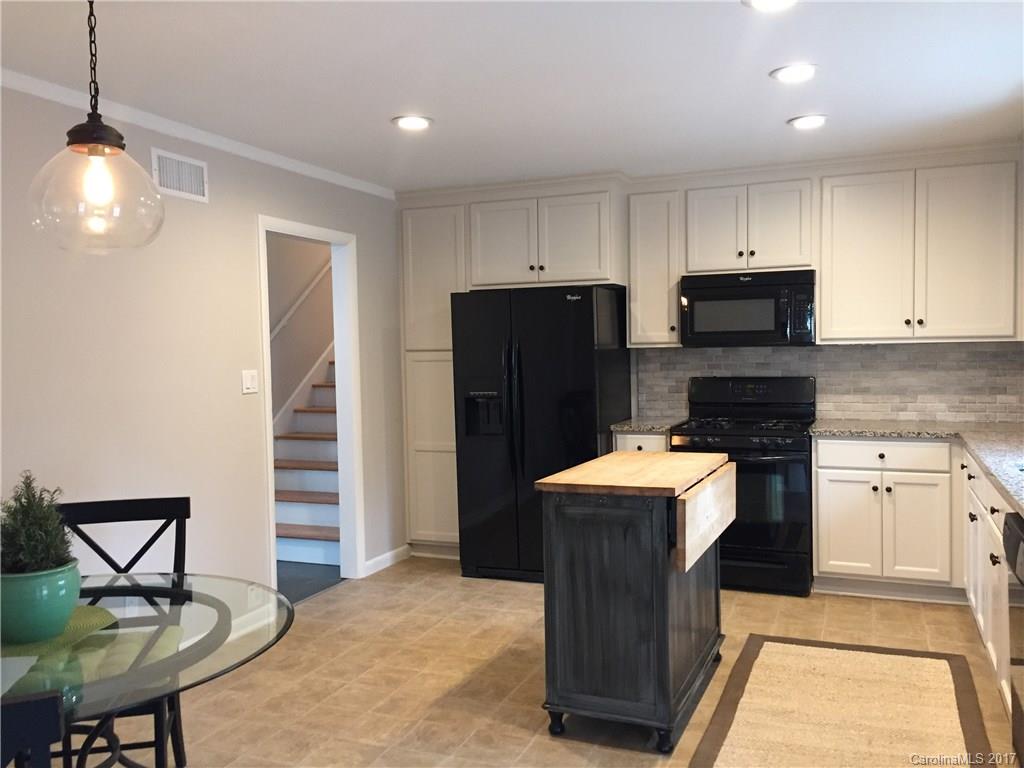 330 Whitestone Road Charlotte, NC 28270 - Photo 6 of 23 a kitchen with stainless steel appliances granite countertop a refrigerator and a stove top oven
