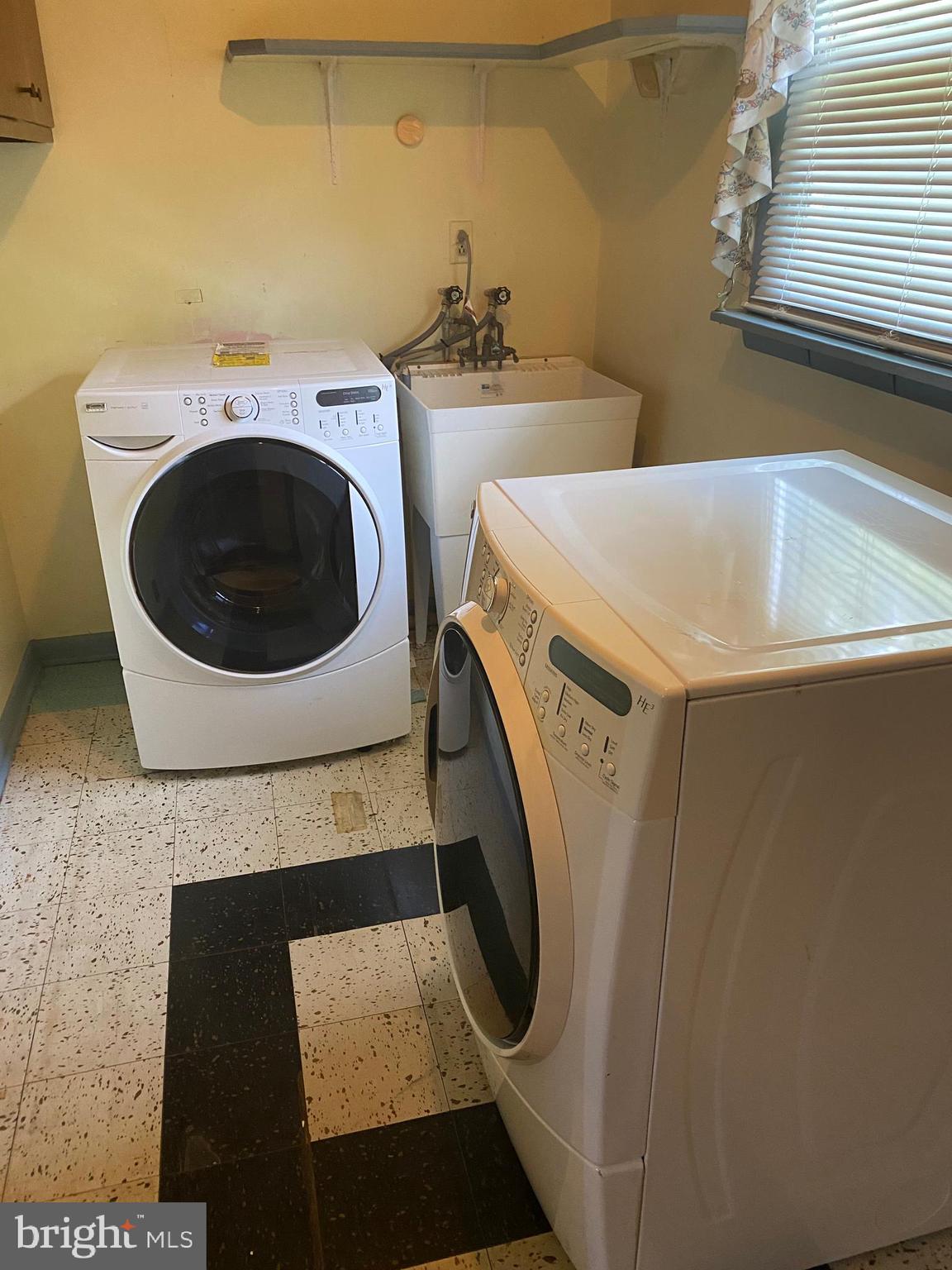 8527 Creek Road Pasadena, MD 21122 - Photo 10 of 18 washer and dryer rooom