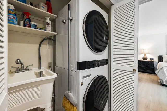 a bedroom with bed and window