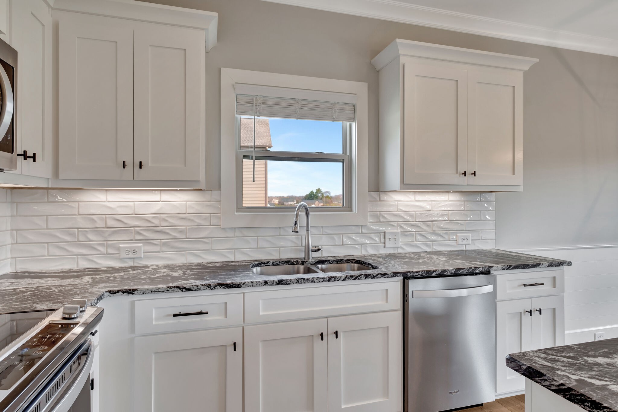 2511 Turner Road Watertown, TN 37184 - Photo 10 of 37 a kitchen with granite countertop white cabinets and window