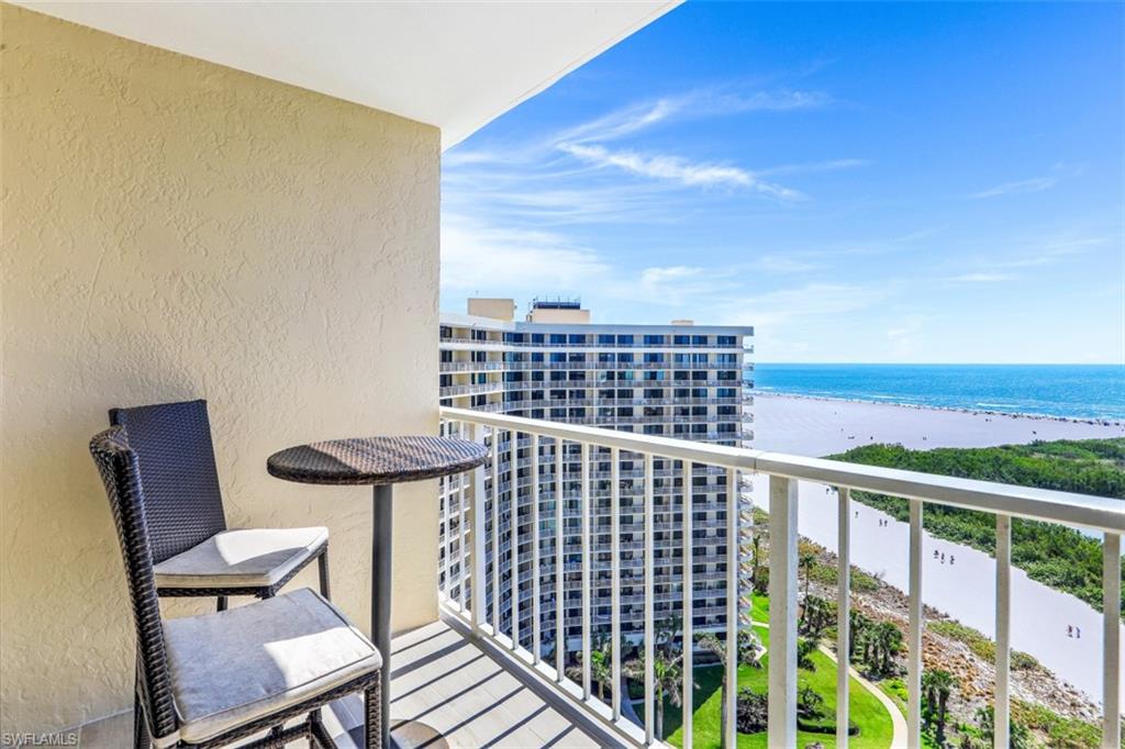 440 Seaview Court, Unit 1805 Marco Island, FL 34145 - Photo 15 of 25 a view of a chairs and table in the balcony