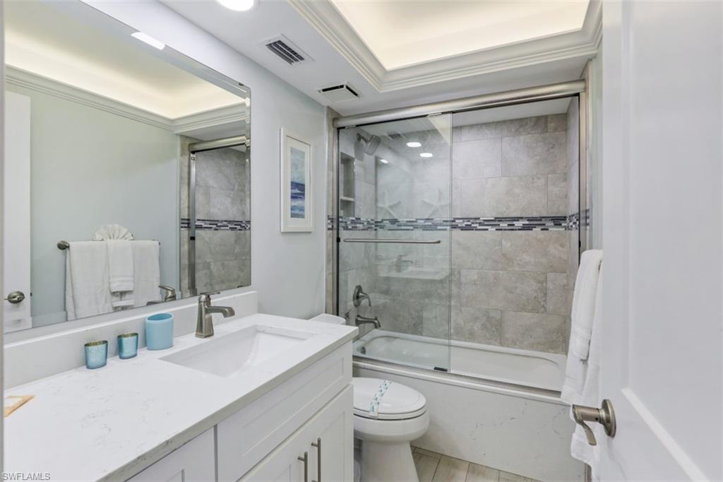 440 Seaview Court, Unit 1805 Marco Island, FL 34145 - Photo 20 of 25 a bathroom with a sink toilet and shower