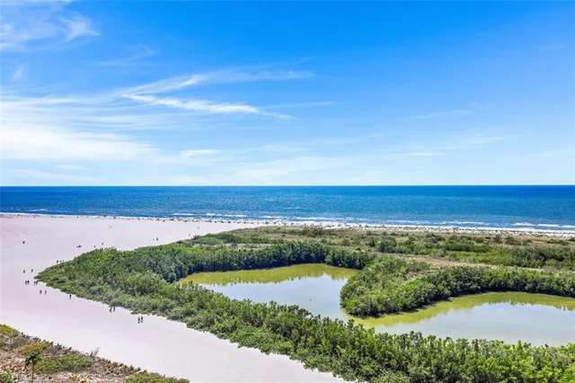 a view of an ocean and a building