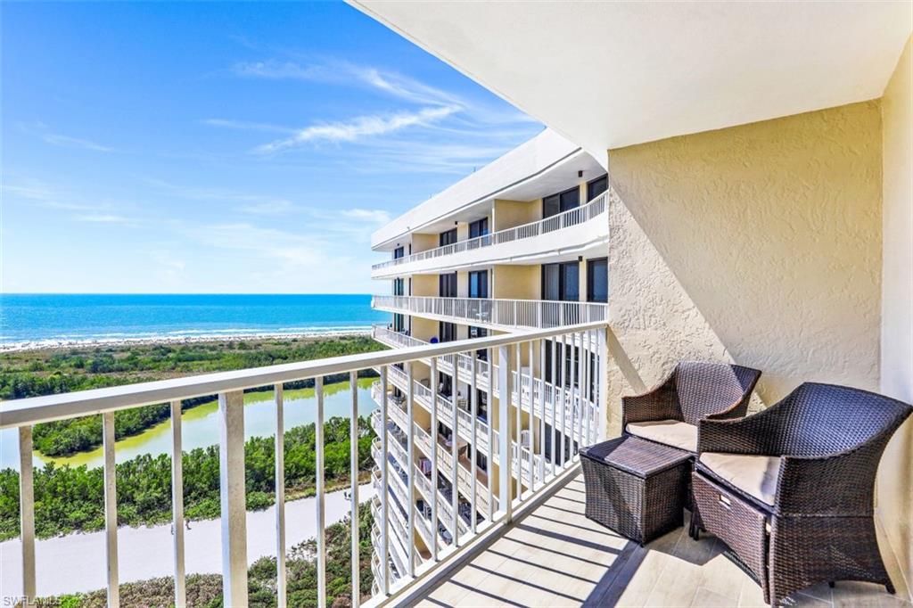 440 Seaview Court, Unit 1805 Marco Island, FL 34145 - Photo 6 of 25 a view of a balcony with chairs