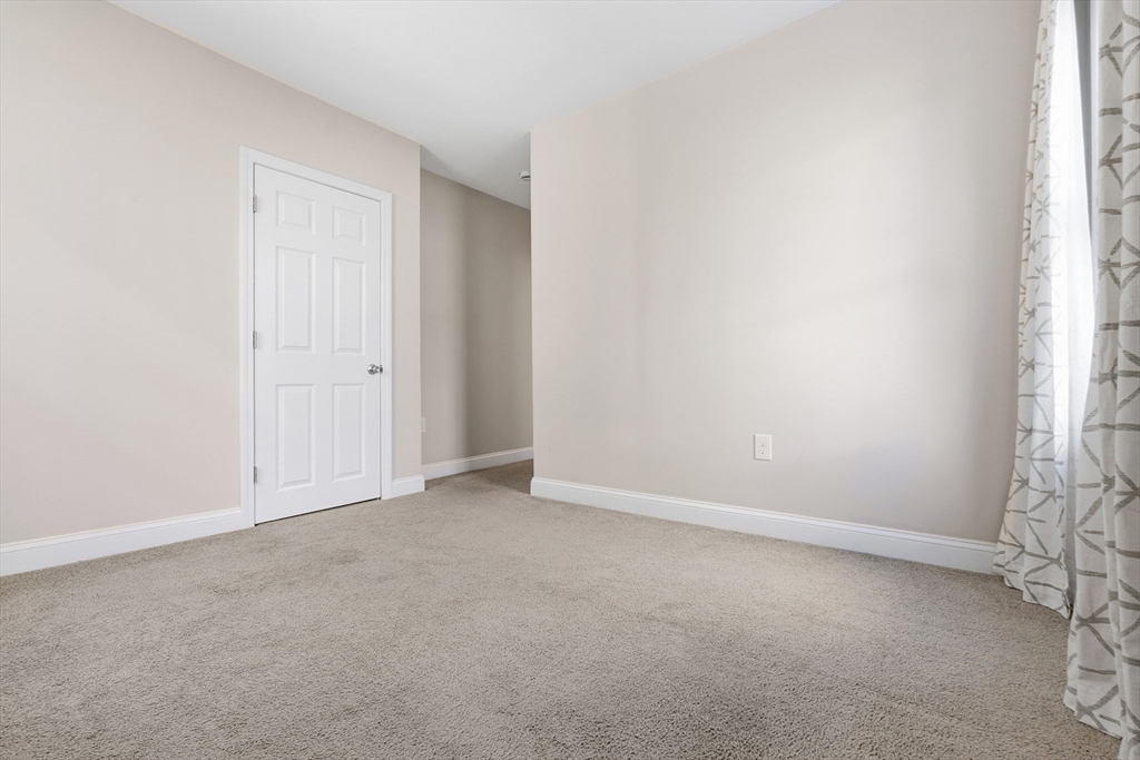 21 Emerton Street, Unit 2 Salem, MA 01970 - Photo 17 of 33 an empty room with windows
