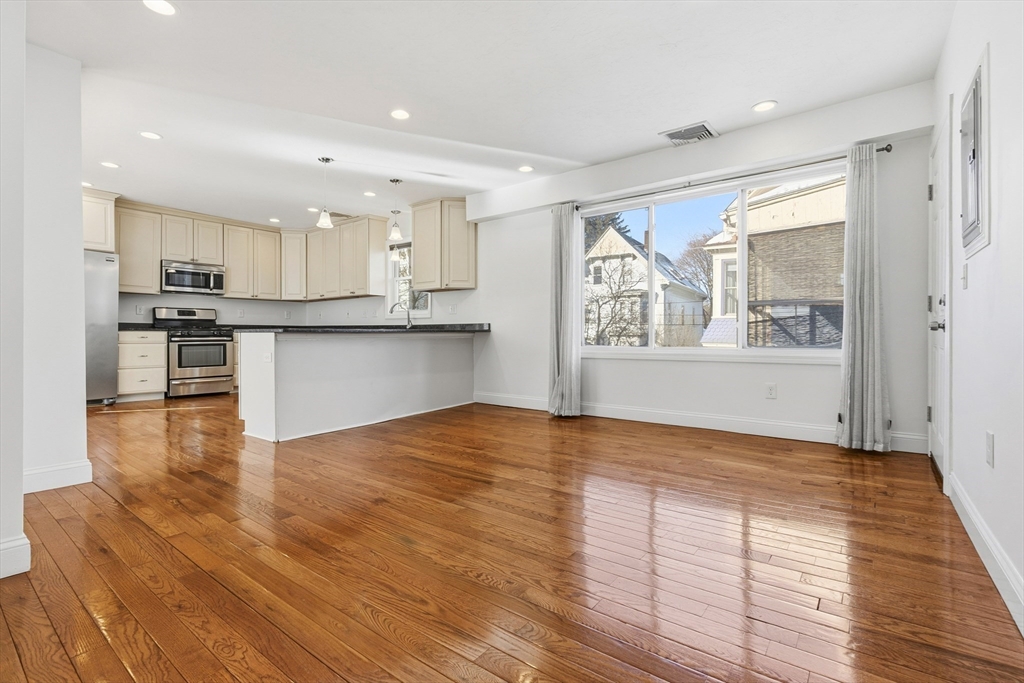 21 Emerton Street, Unit 2 Salem, MA 01970 - Photo 21 of 33 a view of a kitchen with a sink and microwave