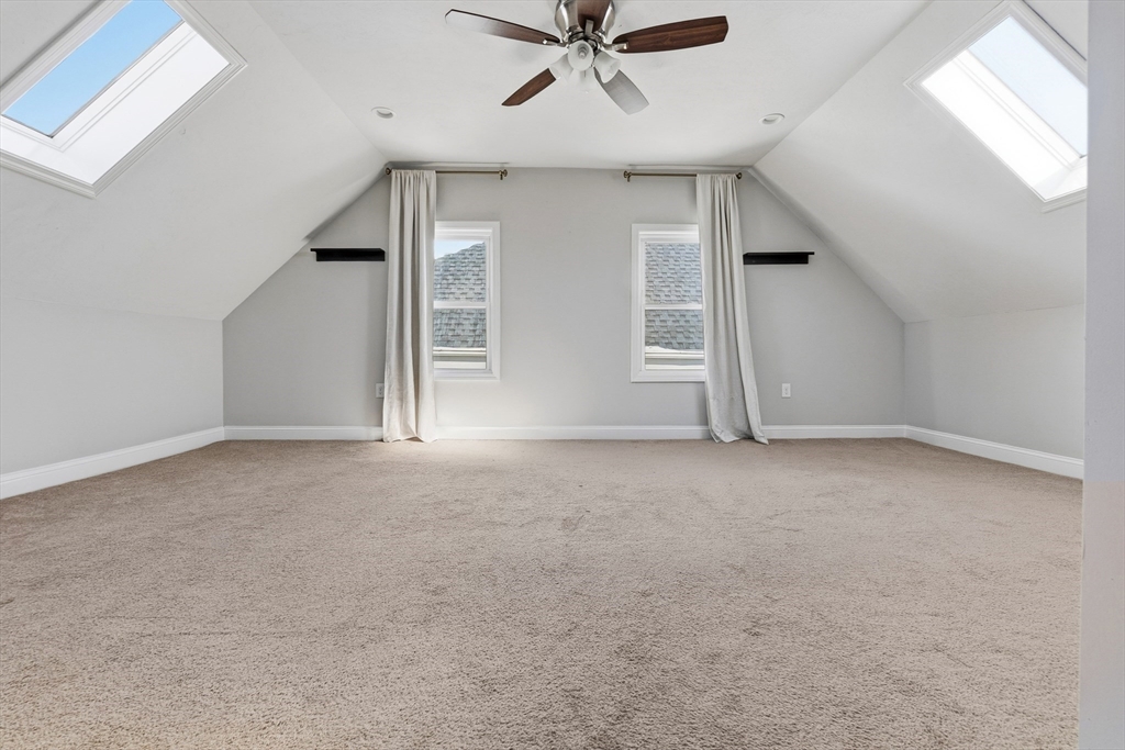 21 Emerton Street, Unit 2 Salem, MA 01970 - Photo 25 of 33 a view of a livingroom with a ceiling fan and window
