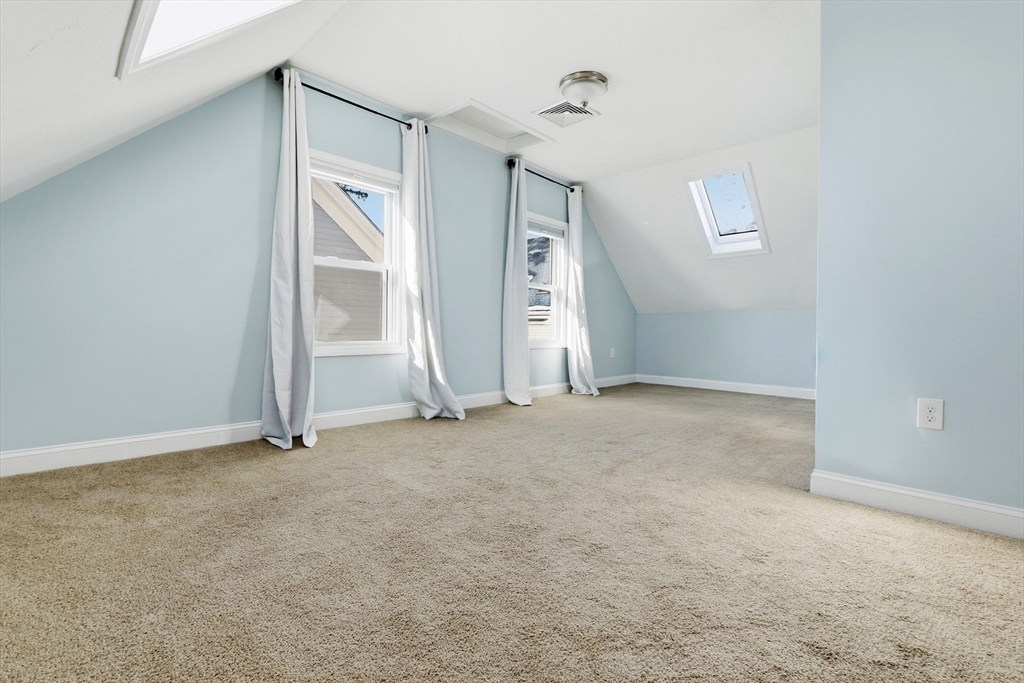 21 Emerton Street, Unit 2 Salem, MA 01970 - Photo 30 of 33 an empty room with windows