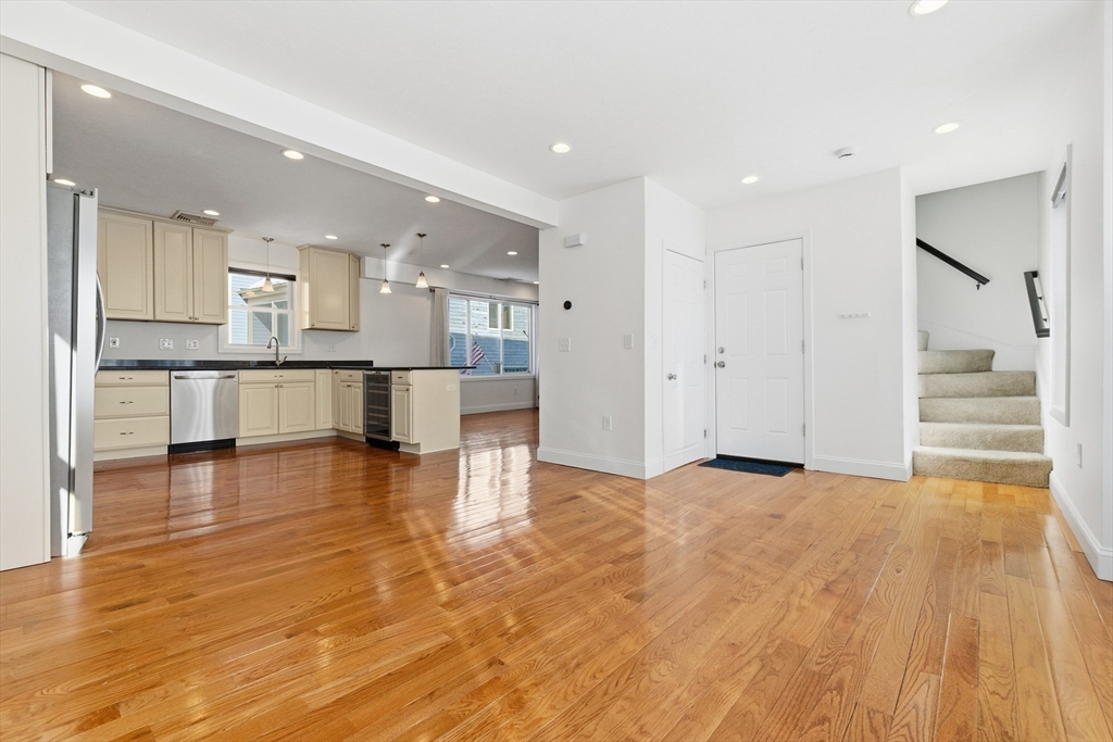 21 Emerton Street, Unit 2 Salem, MA 01970 - Photo 3 of 33 a view of large kitchen with granite countertop a large counter top and stainless steel appliances