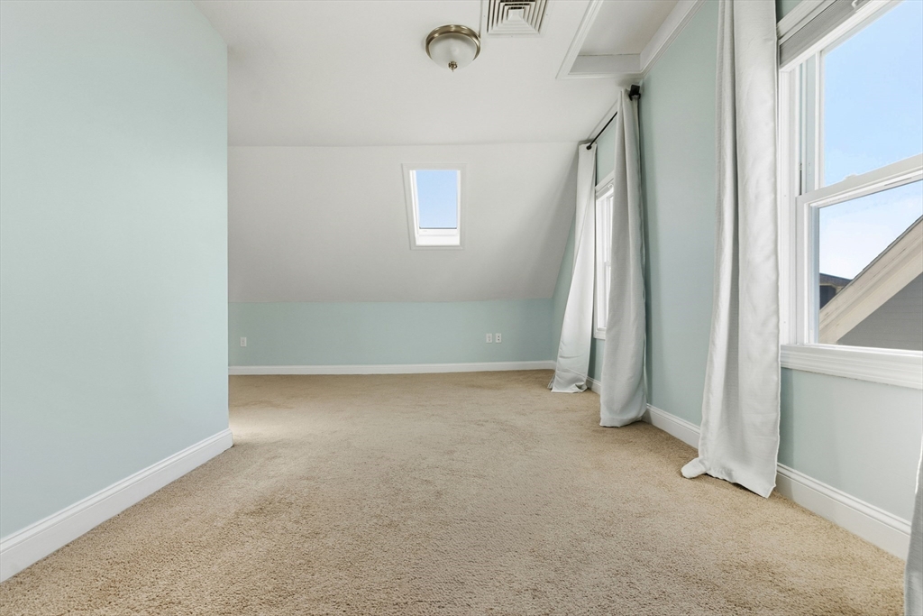 21 Emerton Street, Unit 2 Salem, MA 01970 - Photo 31 of 33 an empty room with windows