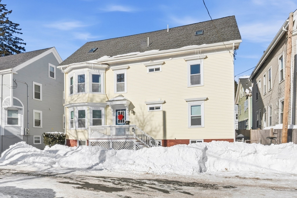 21 Emerton Street, Unit 2 Salem, MA 01970 - Photo 33 of 33 a view of a building with a bed