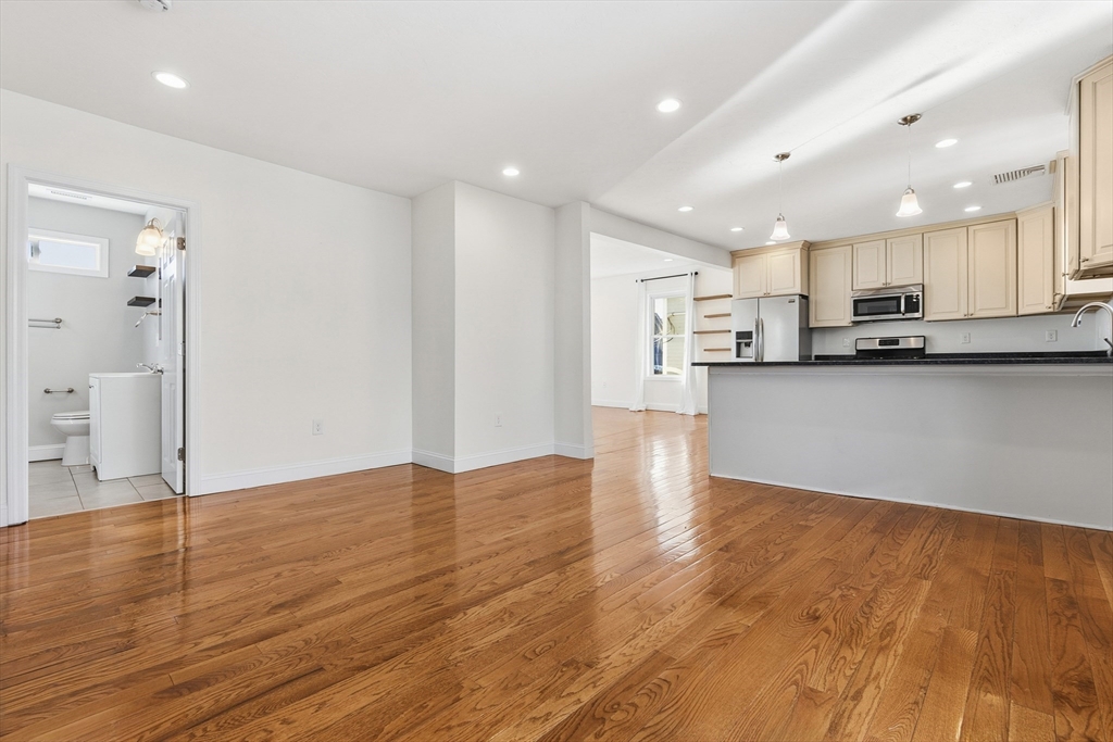 21 Emerton Street, Unit 2 Salem, MA 01970 - Photo 10 of 33 a view of kitchen with wooden floor