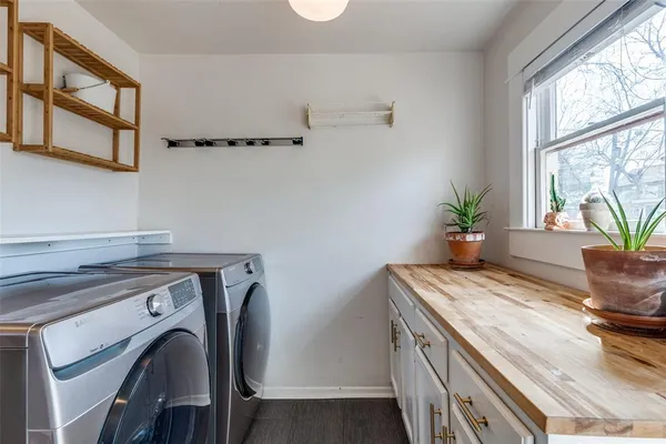 a view of utility room and bedroom