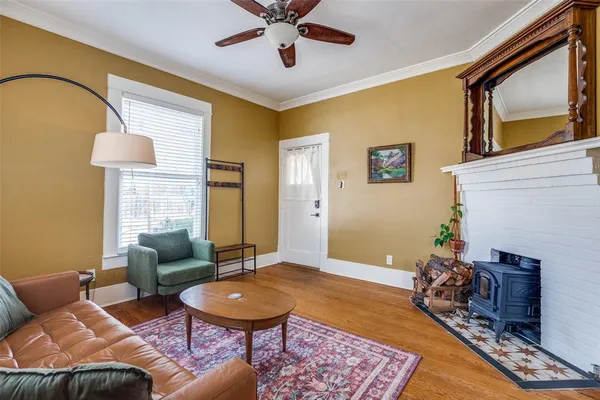 a living room with furniture and a rug
