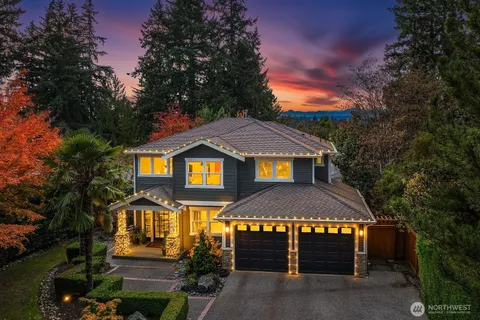 a living room with furniture flat screen tv and a fireplace