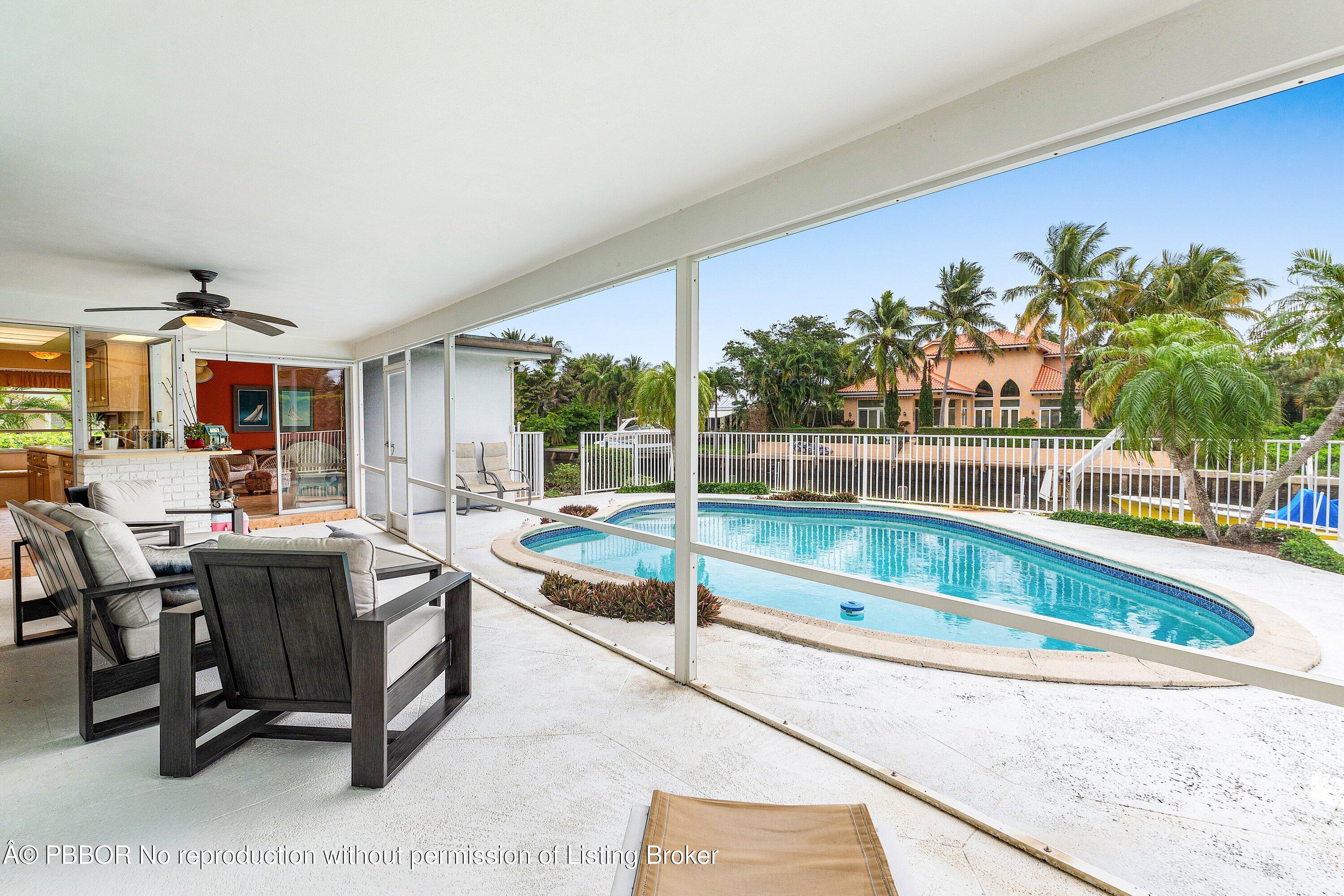 23 Sabal Island Drive Ocean Ridge, FL 33435 - Photo 14 of 16 a view of a living room and kitchen