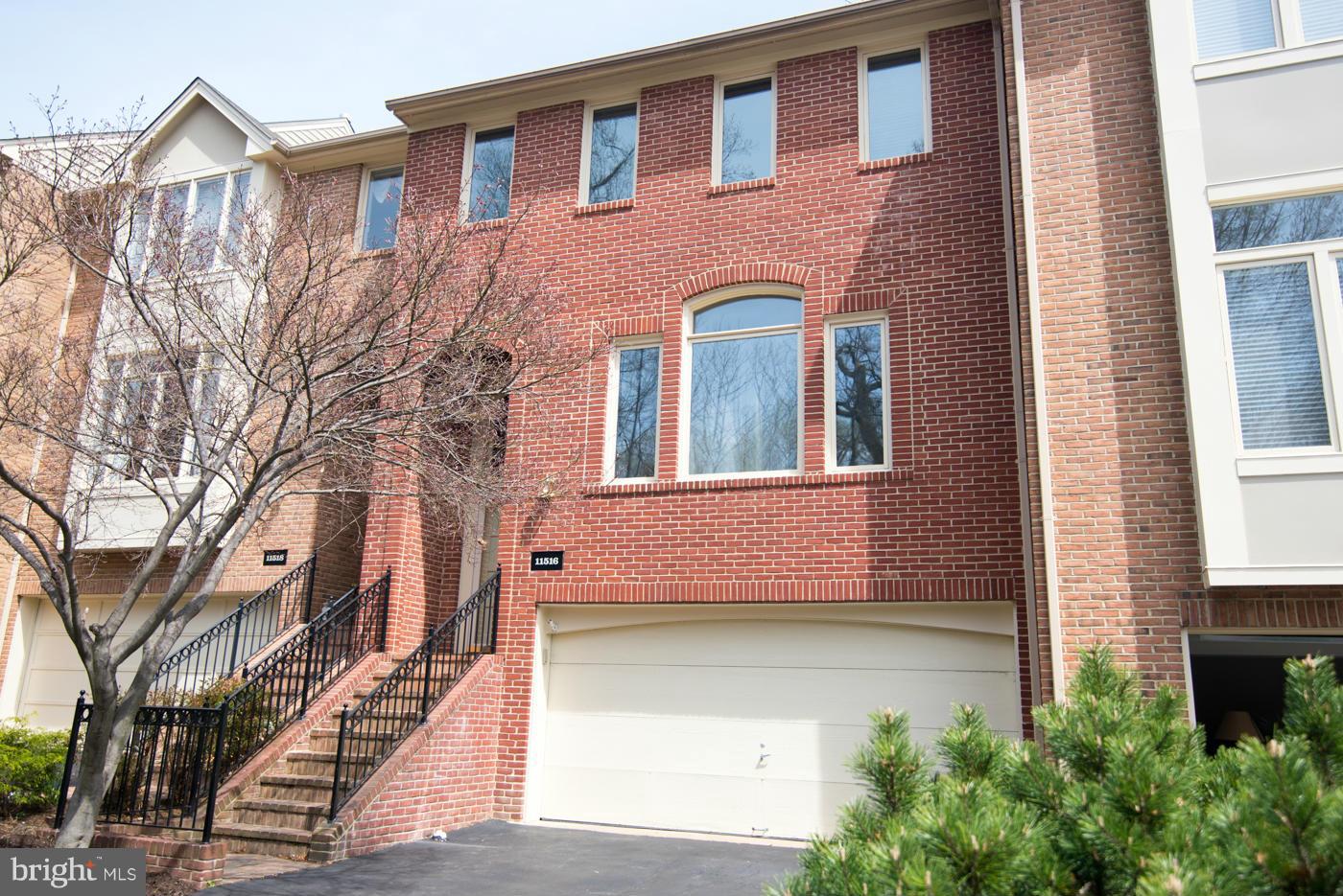 11516 Hemingway Drive Reston, VA 20194 - Photo 1 of 30 Brick 2-car garage townhouse
