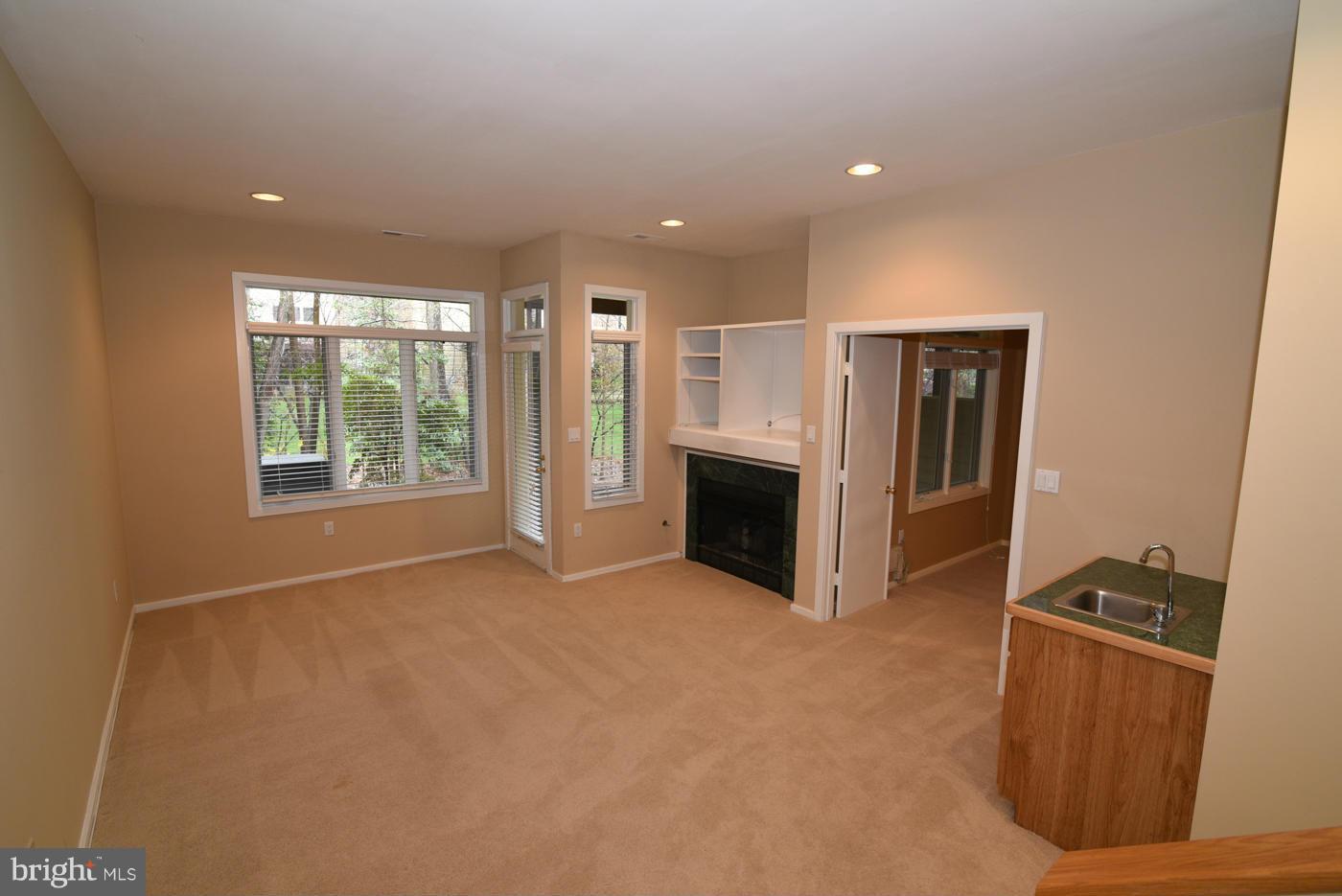 11516 Hemingway Drive Reston, VA 20194 - Photo 23 of 30 Second family room with gas fireplace