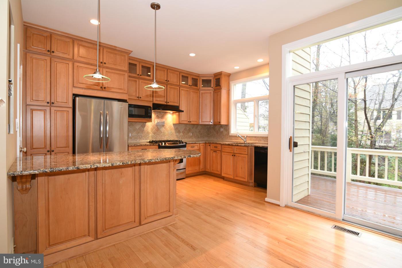 11516 Hemingway Drive Reston, VA 20194 - Photo 7 of 30 Remodeled kitchen with custom cabinetry
