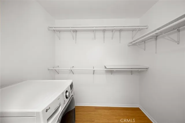 a view of a swimming pool with outdoor seating