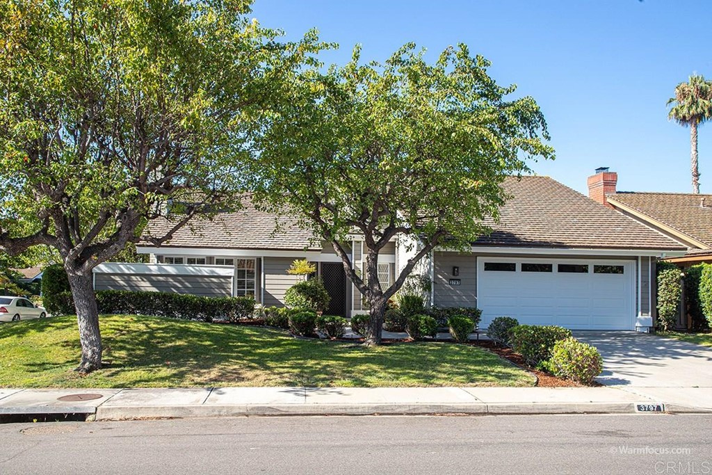 front view of house with a yard