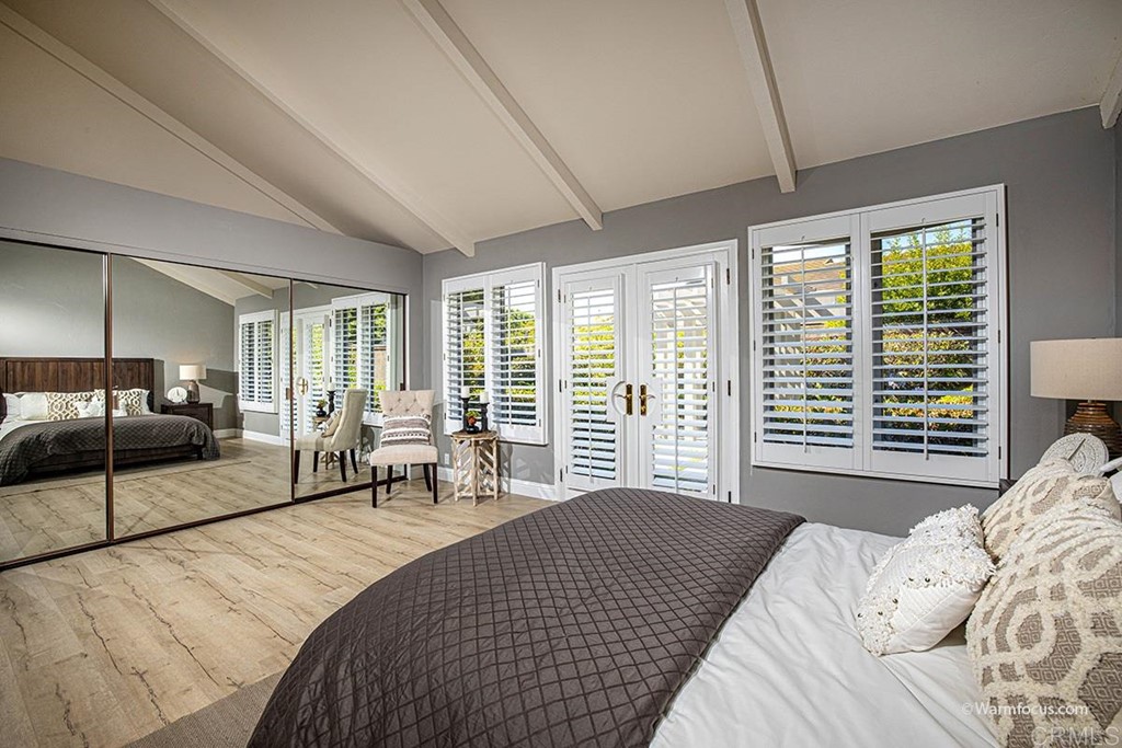 3797 Via Vuelta Rancho Santa Fe, CA 92091 - Photo 16 of 29 a bedroom with a large bed and large windows