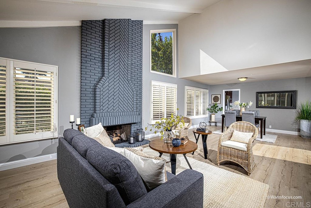 3797 Via Vuelta Rancho Santa Fe, CA 92091 - Photo 6 of 29 a living room with furniture and a fireplace