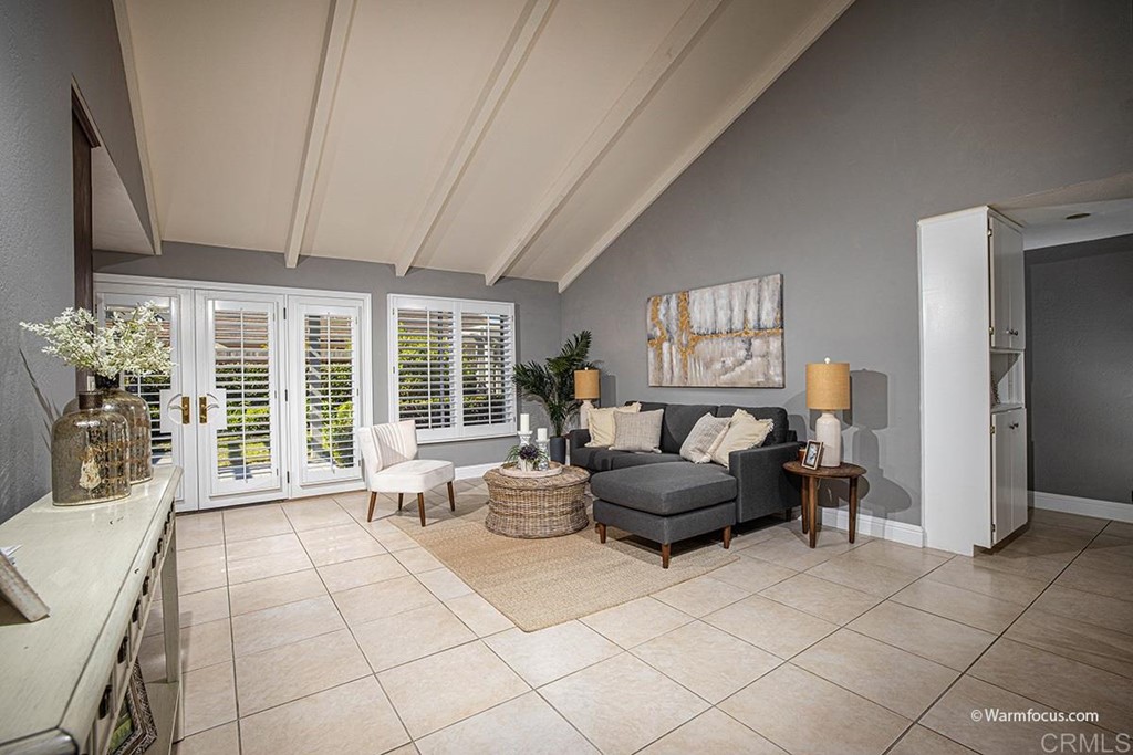 3797 Via Vuelta Rancho Santa Fe, CA 92091 - Photo 10 of 29 a living room with furniture and a large window