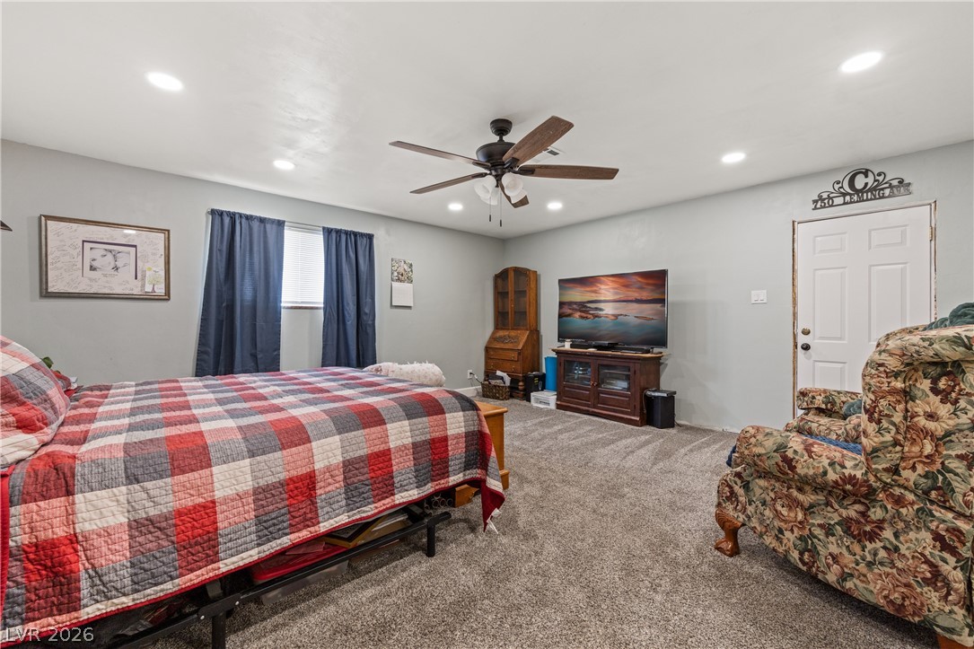 750 Leming Avenue Overton, NV 89040 - Photo 45 of 82 This spacious room features cozy flooring and bright recessed lighting, creating an inviting atmosphere.