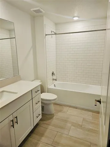 a view of an ocean and trees