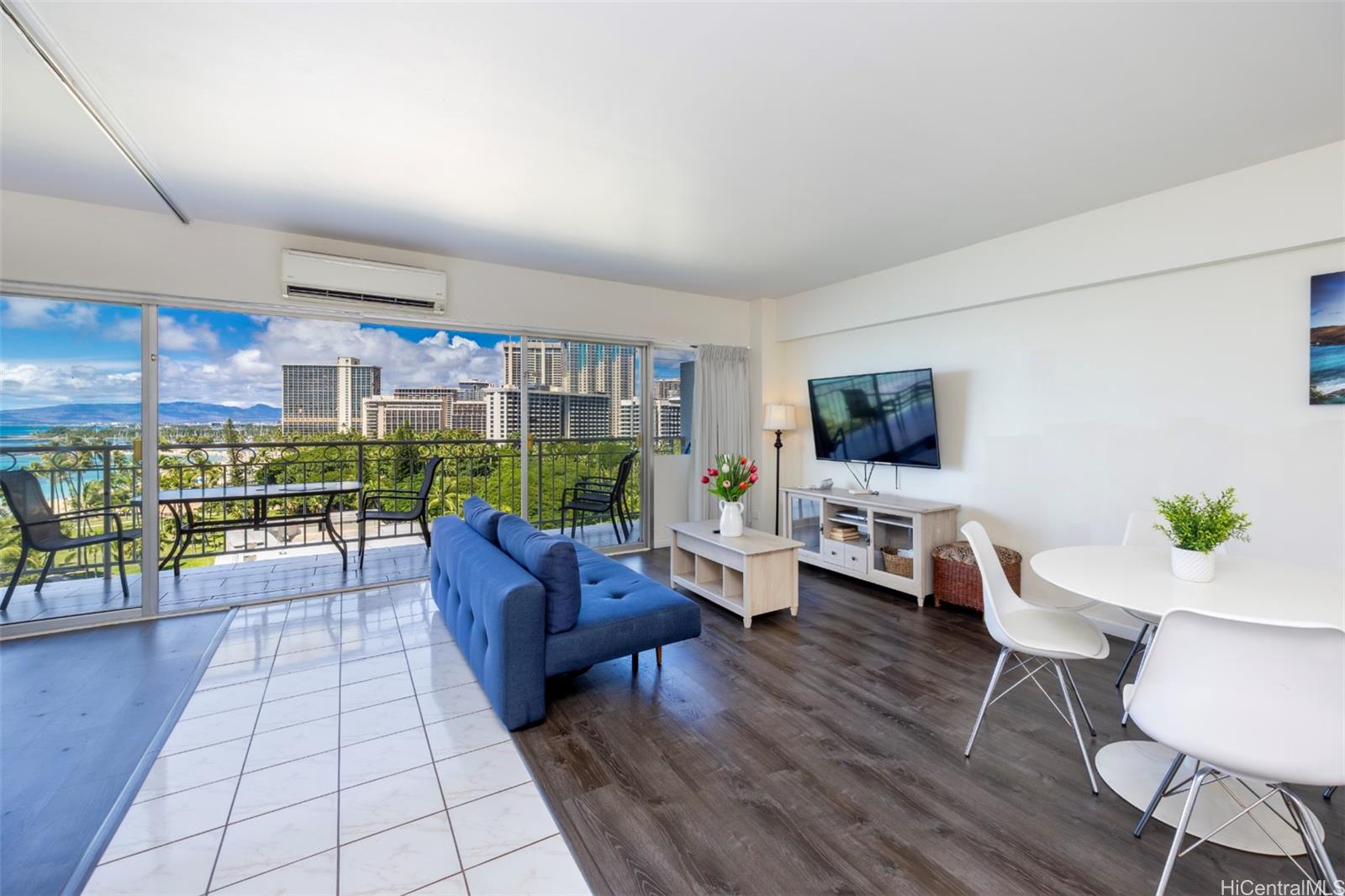 2161 Kalia Road, Unit 1012 Honolulu, HI 96815 - Photo 12 of 25 a living room with furniture and a flat screen tv